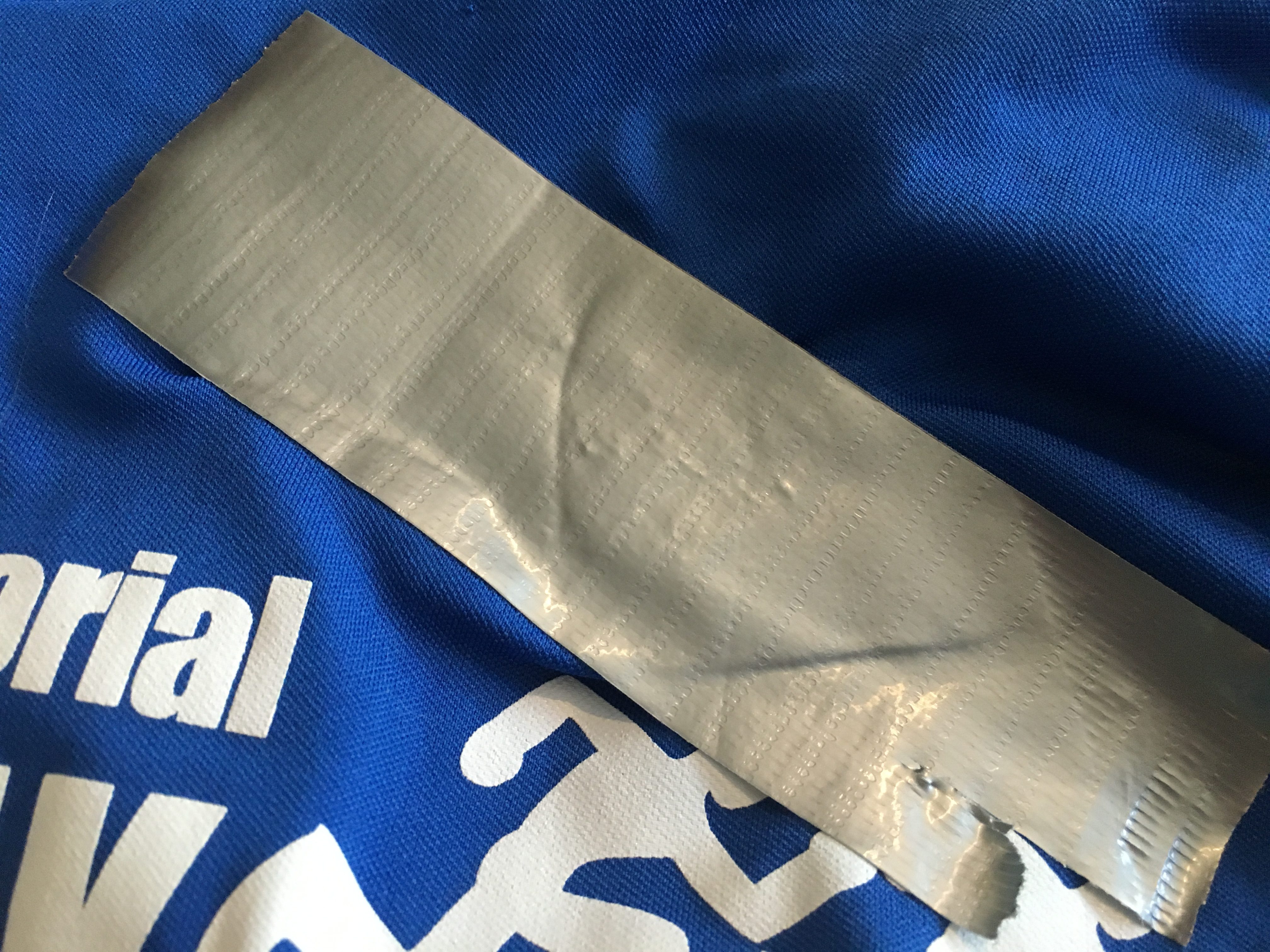 Removing sticker residue from shirt